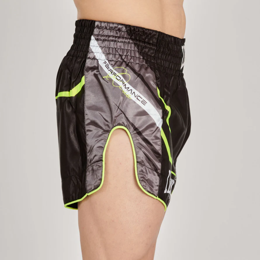pantaloncini-thai-kick-leone-revo-con-spacco-laterale-nero-fluorescente.jpg.webp